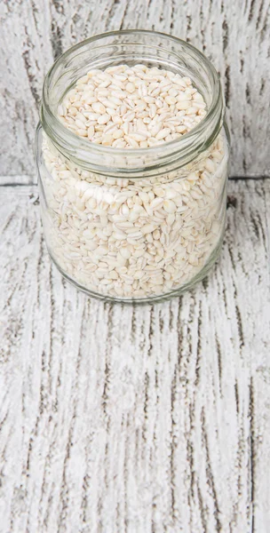 Witte gierst in mason jar — Stockfoto