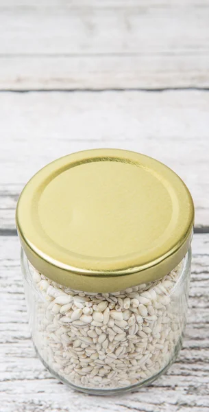 White millet in mason jar — Stock Photo, Image