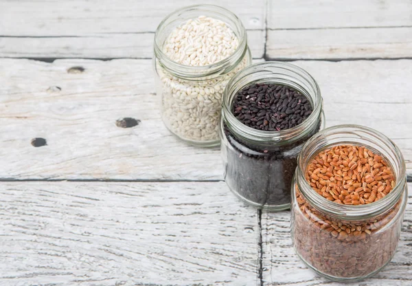 White, brown, black millet — Stock Photo, Image