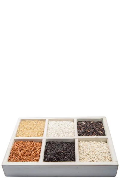Рис и просо в коробке — стоковое фото