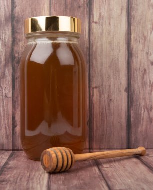 Uzun boylu kavanoz bal