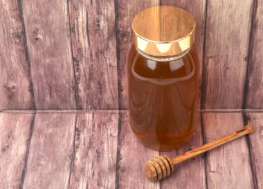 Uzun boylu kavanoz bal