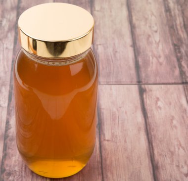 Uzun boylu kavanoz bal