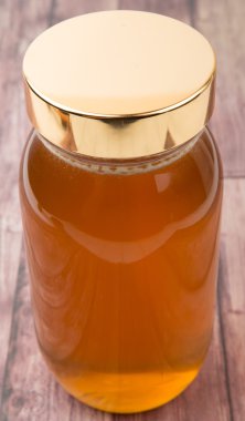 Uzun boylu kavanoz bal