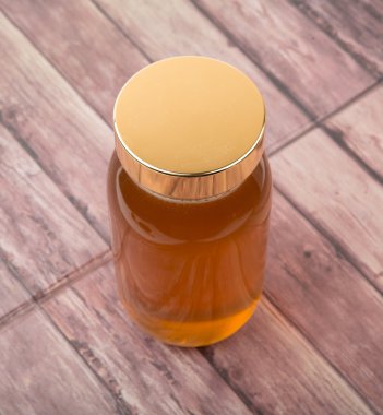 Uzun boylu kavanoz bal