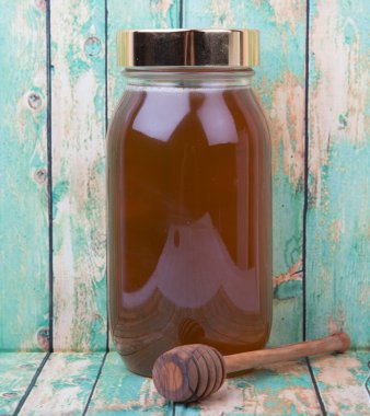 Uzun boylu kavanoz bal