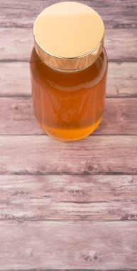 Uzun boylu kavanoz bal