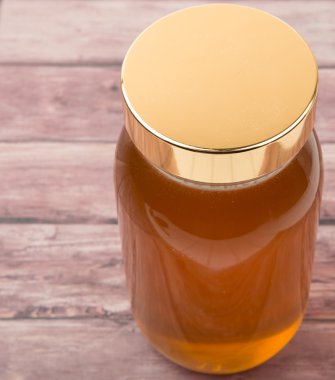 Uzun boylu kavanoz bal