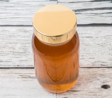 Uzun boylu kavanoz bal