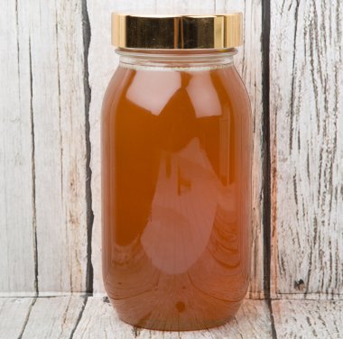 Uzun boylu kavanoz bal