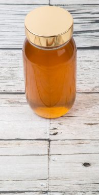 Uzun boylu kavanoz bal