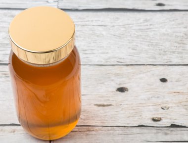 Uzun boylu kavanoz bal