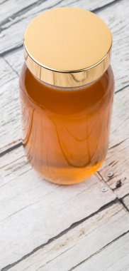 Uzun boylu kavanoz bal