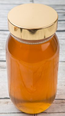 Uzun boylu kavanoz bal