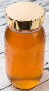 Uzun boylu kavanoz bal