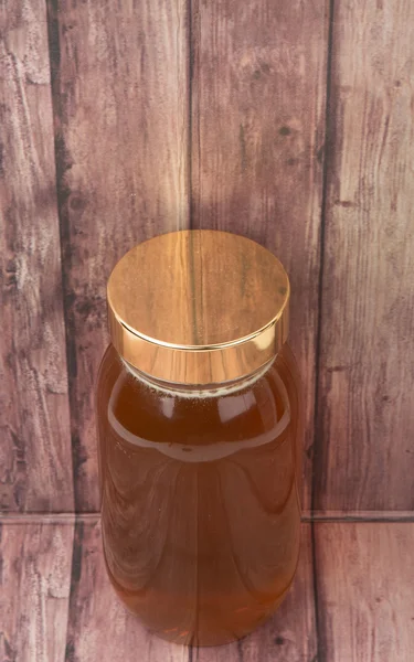 Uzun boylu kavanoz bal