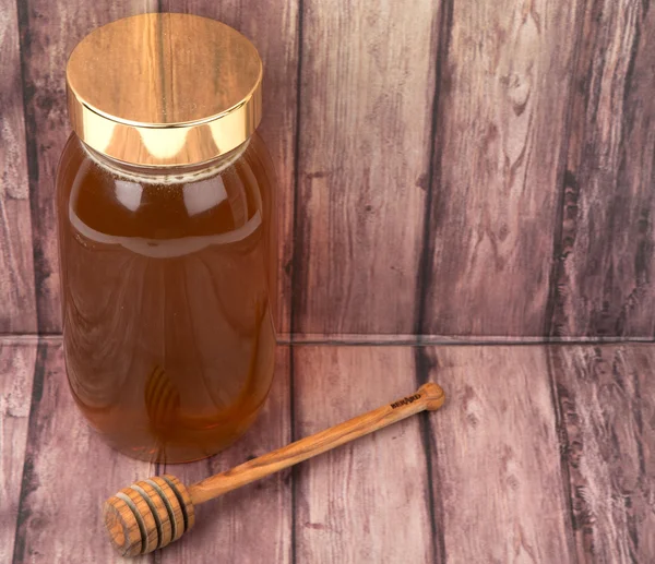 Miel en tarro alto —  Fotos de Stock