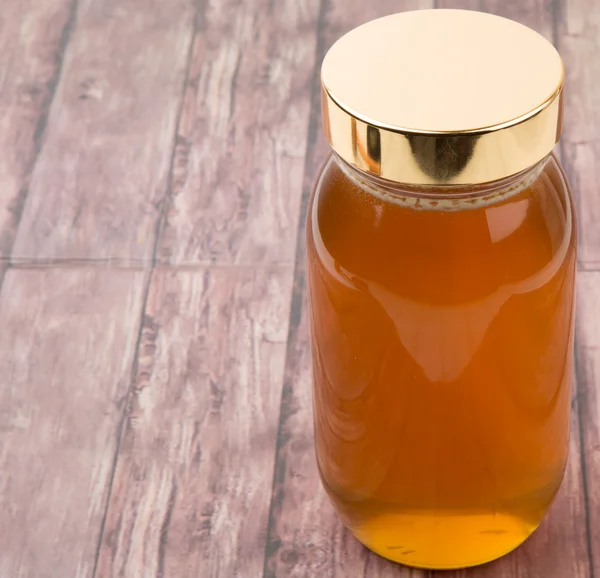 Uzun boylu kavanoz bal