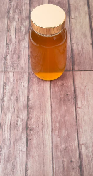 Uzun boylu kavanoz bal