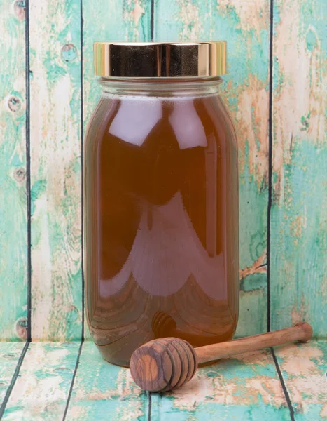 Uzun boylu kavanoz bal