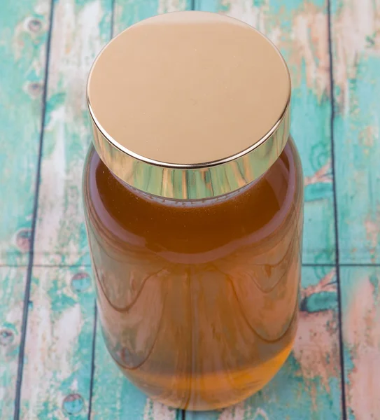 Uzun boylu kavanoz bal