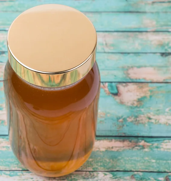 Uzun boylu kavanoz bal