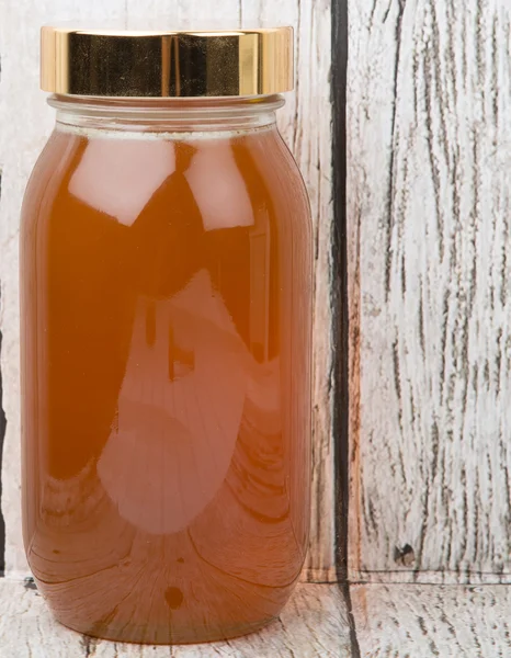 Miel en tarro alto —  Fotos de Stock