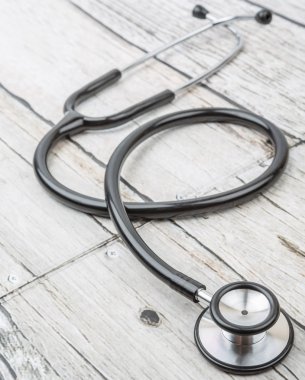 Sağlık stetoskop ahşap arka plan