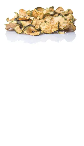 Torkas porcini svamp i en vit skål över vit bakgrund — Stockfoto