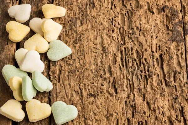 Sfondo con caramelle a forma di cuore — Foto Stock