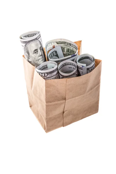 Dólares en una bolsa de compras — Foto de Stock