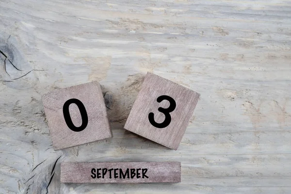 Closeup Kubus Kalender Voor September Een Houten Achtergrond Met Kopieerruimte — Stockfoto