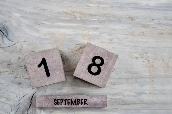 Closeup Kubus Kalender Voor September Een Houten Achtergrond Met Kopieerruimte — Stockfoto