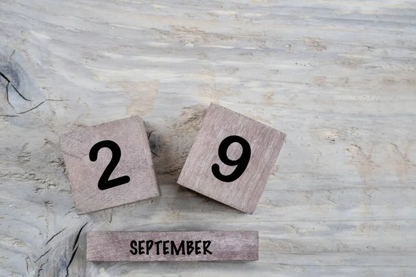 Closeup Kubus Kalender Voor September Een Houten Achtergrond Met Kopieerruimte — Stockfoto