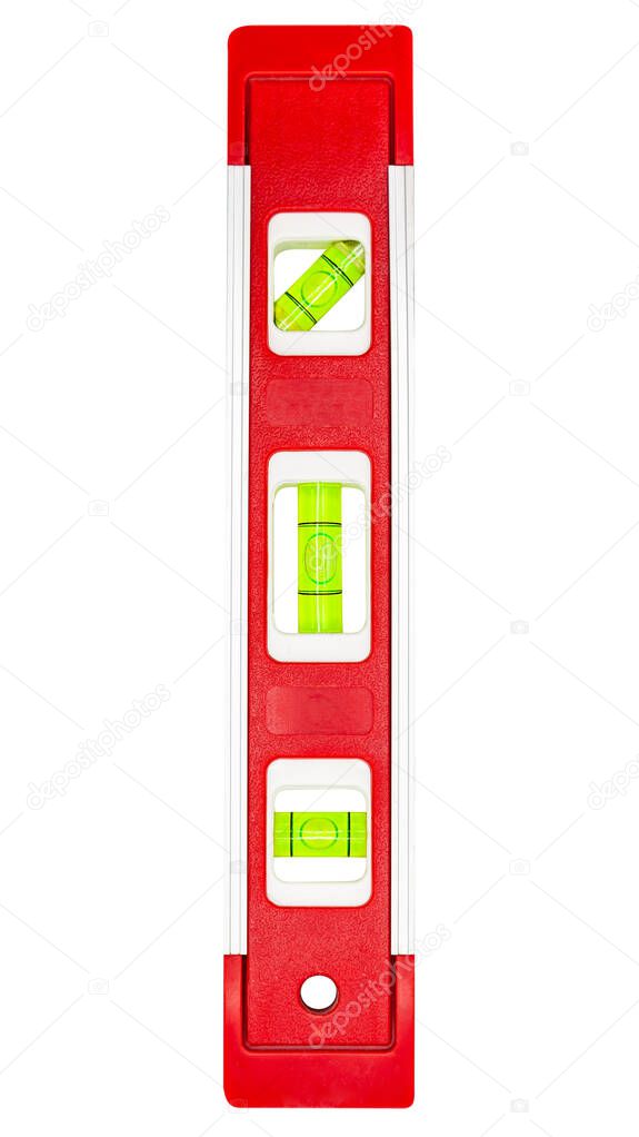 Red building level, close-up shot of Bubble spirit level for construction work, isolated on white background, clipping paths included