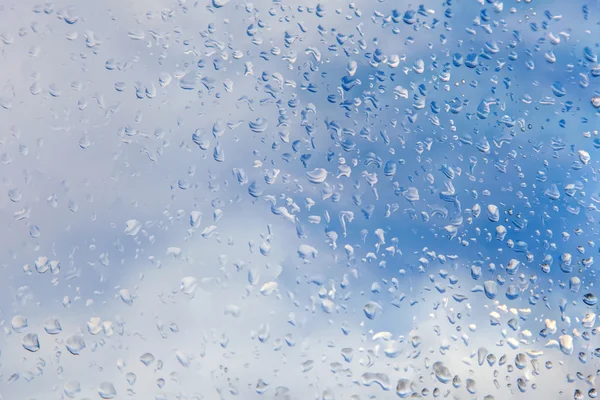 Gotas de chuva no vidro da janela — Fotografia de Stock