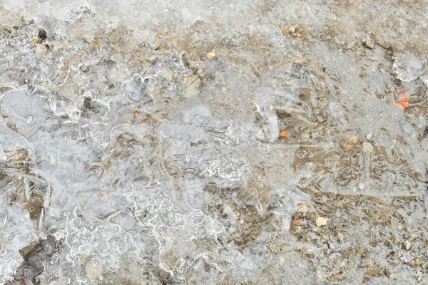 pattern on ice. Icy glass natural pattern closeup. Frost and sun on winter window. Beautiful frost and ice pattern on window surface in black and white. Abstract background and texture for design. abstract Ice texture Winter background