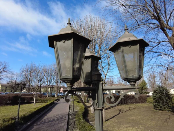 old vintage street lamps. pillars of stinkers on the street.