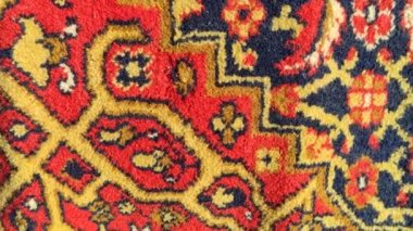 Halıdaki desen. Eski yün halı. Klasik el yapımı halı. Kumaştaki antik süs