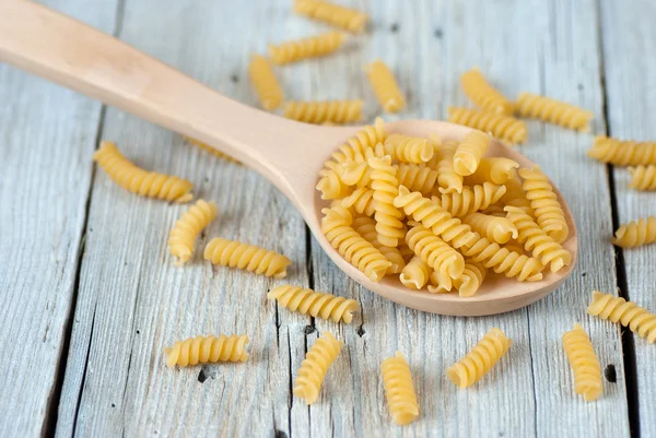 Uncooked fusilli pasta — Stock Photo, Image