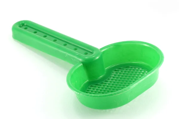 Green sieve toy — Stock Photo, Image