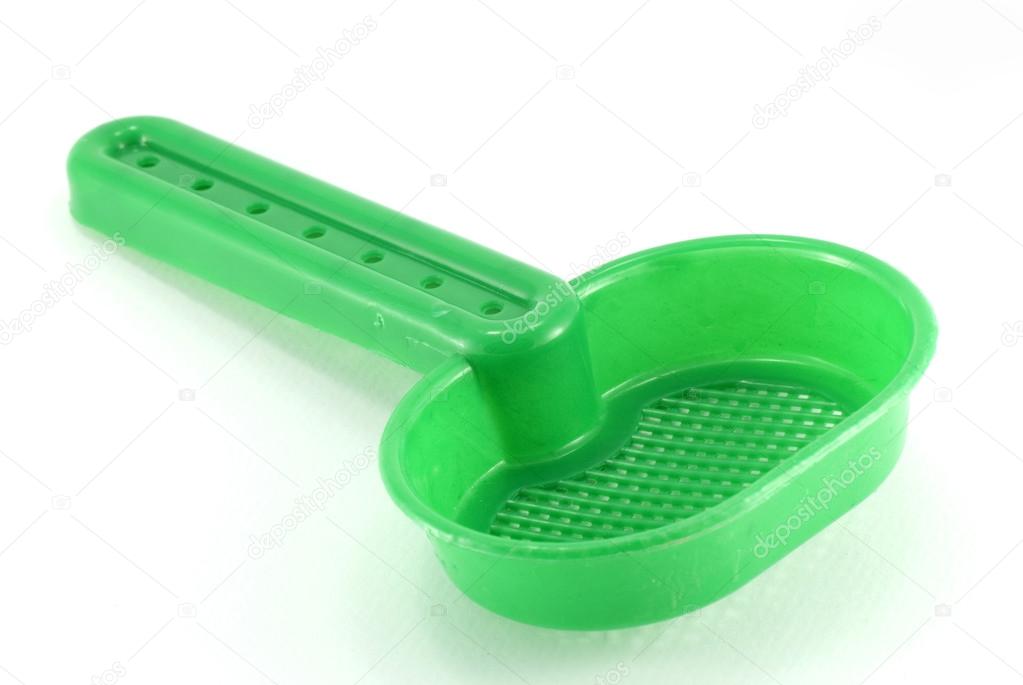 Green sieve toy
