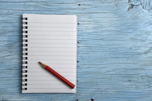 Notepad with red pencil — Stock Photo, Image