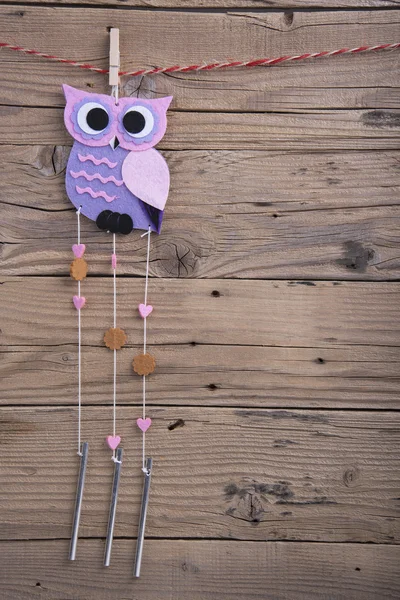 Ornament shaped owl with chimes — Stock Photo, Image