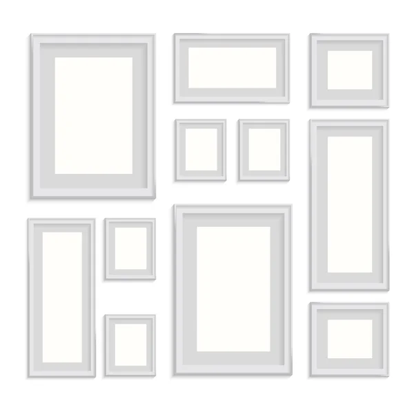 Blank picture frame template set isolated on wall — Stock Vector