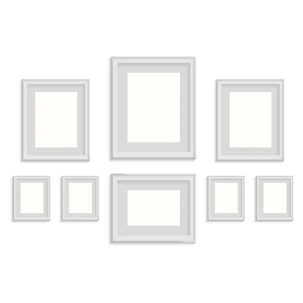 Blank picture frame template set isolated on wall — Stock Vector