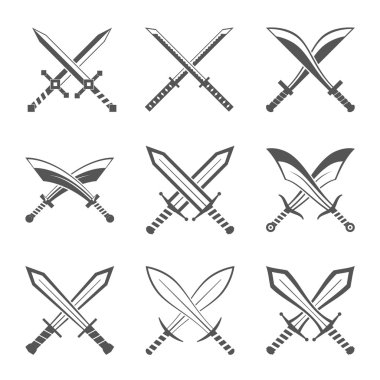 Set of heraldic shields and swords and sabres clipart
