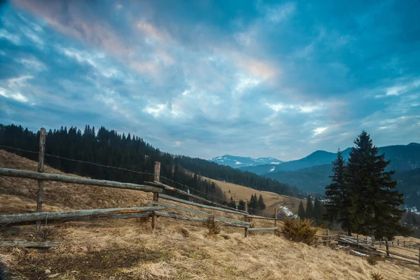 Majestic mountains landscape under morning sky with clouds.