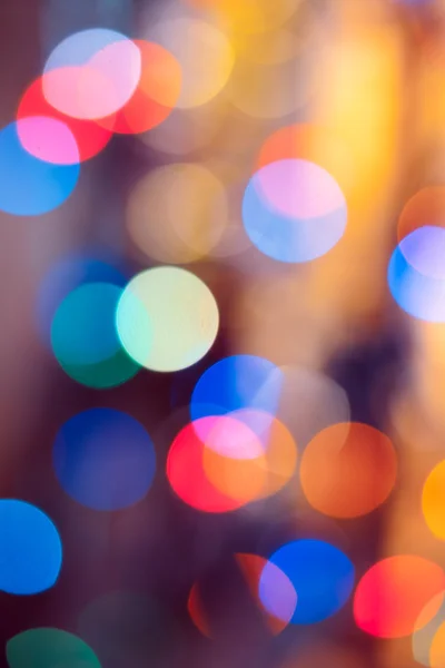 Fond de Noël. Fond abstrait festif avec des lumières et des étoiles bokeh déconcentrées — Photo