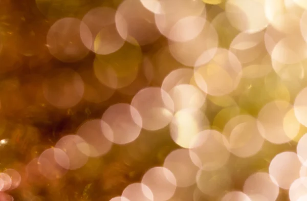 Fond de Noël. Fond abstrait festif avec des lumières et des étoiles bokeh déconcentrées — Photo